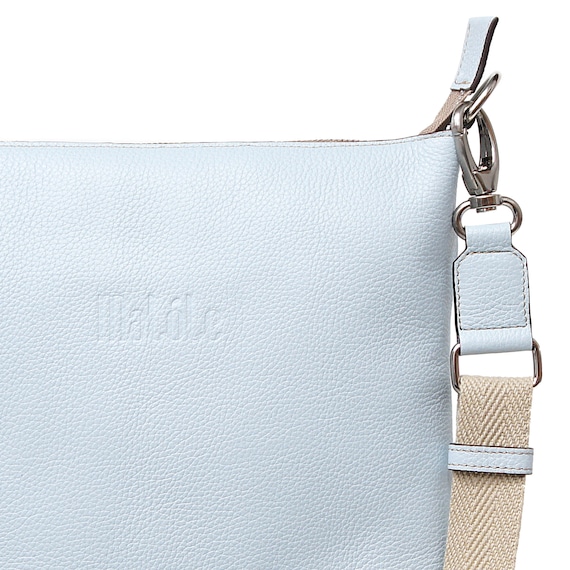 The perfect bag for you: elegant and practical in light sky blue, comfortable and functional, with shoulder strap and internal pockets