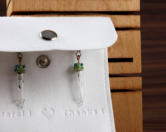 Pair of glass earrings in the shape of light bulbs. Original jewelry in limited quantity. Light and unique jewelry. Minimalist design