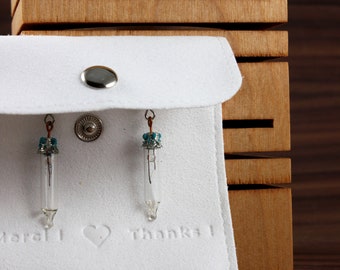 Pair of glass earrings in the shape of light bulbs. Original jewelry in limited quantity. Light and unique jewelry. Minimalist design