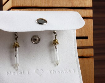 Pair of glass earrings in the shape of light bulbs. Original jewelry in limited quantity. Light and unique jewelry. Minimalist design