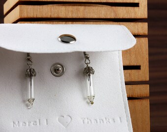 Pair of glass earrings in the shape of light bulbs. Original jewelry in limited quantity. Light and unique jewelry. Minimalist design