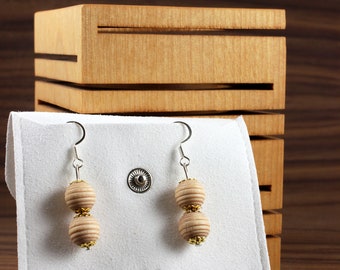 Earrings made of colored wooden beads with golden ornamentation. Unique model in limited quantity!