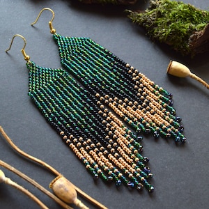 Long beaded green gold earrings