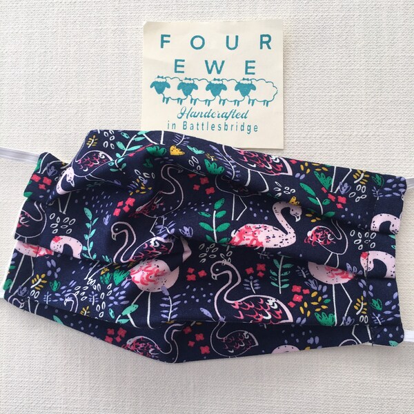 Cotton face covering mask flamingos on dark blue