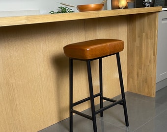 Stig Hyde LEATHER BAR STOOL In Saddle Style – Handcrafted Steel Counter Stool Designed By Paul Frampton