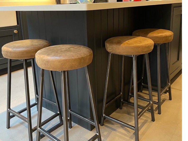 Leather upholstered kitchen bar stools on steel frame
