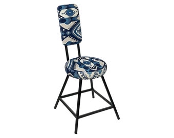 Lianne Faberbach - Steel framed dining chair with fabric upholstered seat and backrest