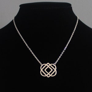 Handmade Celtic Four Heart Pendant in Sterling Silver – Interwoven Knot Necklace