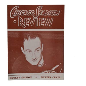 May include: A vintage Chicago Stadium Review magazine cover in shades of brown and white. The cover features a black and white portrait of a man and the text "Chicago Stadium Review" and "Hockey Edition".