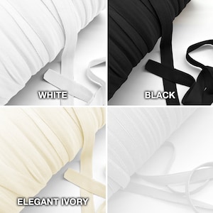 Pu&ograve; includere: Un collage di quattro rocchetti di nastro elastico in bianco, nero, avorio elegante e bianco. Ogni rocchetto &egrave; etichettato con il rispettivo nome del colore. L'elastico &egrave; avvolto strettamente, con una porzione srotolata per mostrare la larghezza del nastro.