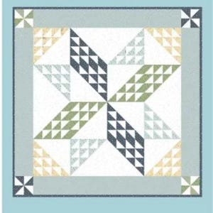 May include: A quilt pattern titled Baby Sugarhouse Star by Amy Smart Diary of a Quilter. The design features a central star motif composed of dark blue, sage green, and cream triangles on a white background, framed by a light blue border with corner pinwheel blocks.