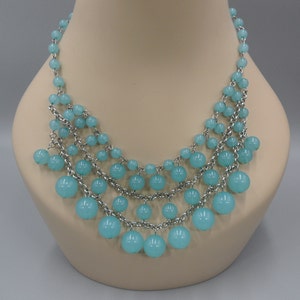 Collier de perles perles Art Déco Gradué Perles Lucite Bleues Translucides Rolo Rosaire Chaîne
