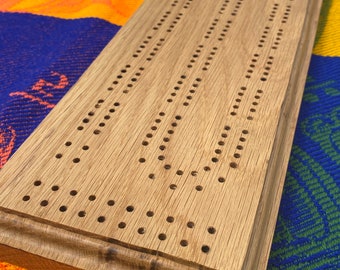 Solid wood, hand made cribbage board
