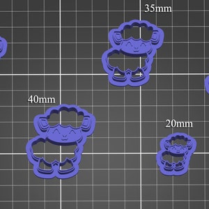 Puede incluir: Cuatro cortadores de galletas de plástico morado con forma de oveja, de diferentes tamaños: 30 mm, 40 mm, 35 mm y 20 mm.