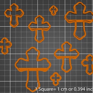 May include: A set of seven orange plastic cookie cutters shaped like crosses. The cutters are of different sizes and have a decorative design. 1 Square = 1 cm or 0.394 inches.