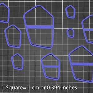 May include: Set of eight blue plastic cookie cutters shaped like houses with windows. Each cutter is approximately 1 inch wide. 1 Square = 1 cm or 0.394 inches.