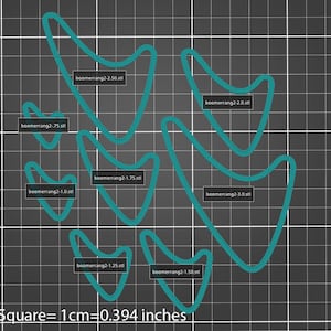 Könnte beinhalten: Ein Satz von sechs tealblauen Schablonen in Boomerangform, jede mit einer anderen Größe, beschriftet mit ihren entsprechenden Dateinamen. Die Schablonen befinden sich auf einem grauen Gitterhintergrund mit dem Text "1 Quadrat = 1 cm = 0.394 Zoll".
