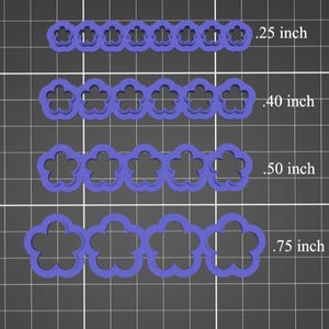 May include: Four sets of purple flower-shaped cookie cutters, each set with a different size. The sizes are 0.25 inch, 0.40 inch, 0.50 inch, and 0.75 inch.