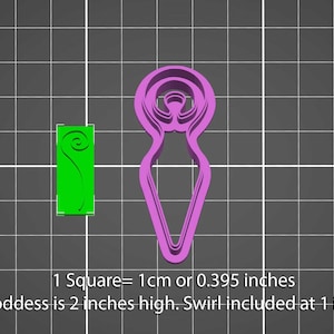 May include: A pink plastic cookie cutter shaped like a goddess with a swirl design. The cutter is 2 inches high and includes a smaller swirl cutter. 1 Square = 1 cm or 0.395 inches.
