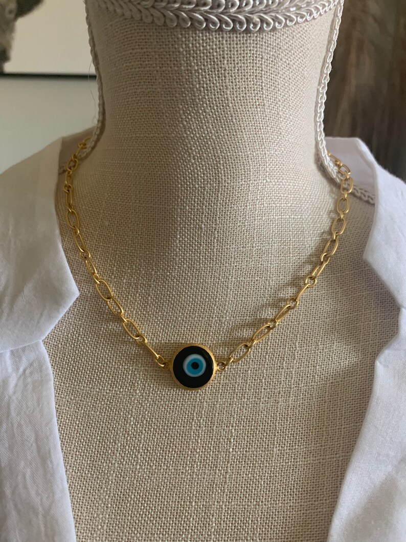 Large Blue Evil Eye matte gold filled necklace.