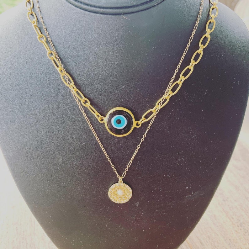 Large Blue Evil Eye matte gold filled necklace.