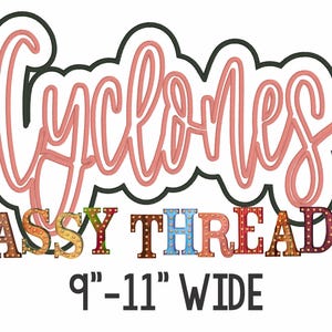 May include: A pink neon sign that reads "Cyclones" with a black outline. Below the sign is the text "SASSY THREADZ" in colorful block letters with light bulbs. The text "9" - 11" WIDE" is below the letters.