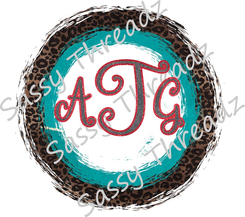 May include: Circular design with a white center, teal and leopard print accents, and a distressed brown border. The letters "ATG" are in the center, with a red outline and a gray glitter fill.