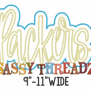 May include: A white background features the word "Packers" in a light yellow, outlined in blue. Below, the text "Sassy Threadz" is in colorful, marquee-style letters. The design is 9"-11" wide.