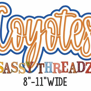 May include: Orange and blue outline of the word "Coyotes" with a colorful, multi-colored, light-up sign that reads "SASSY THREADZ" below. The sign is 8 to 11 inches wide.