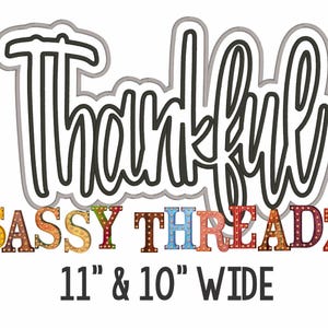 May include: A black and white outline of the word "thankful" with a gray shadow. Below the word is the text "SASSY THREADZ" in colorful letters with light bulbs. The text "11" & 10" WIDE" is below the colorful letters.