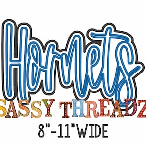 May include: Blue outlined word "Hornets" with a black outline. Below the word is the text "SASSY THREADZ" in colorful block letters with light bulbs. The text "8" - 11" WIDE" is below the colorful text.