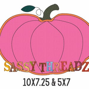 May include: Pink pumpkin with an orange outline and a green stem. The text "SASSY THREADZ" is below the pumpkin in colorful letters. The text "10X7.25 & 5X7" is below the text "SASSY THREADZ".