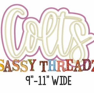 May include: A white "Let's" sign with a pink outline. The sign is made of a decorative material that resembles a marquee or light-up sign. The sign is accompanied by the text "SASSY THREADZ" in colorful letters and the text "9"-11" WIDE" in black.