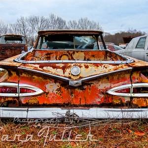 Photograph of a 1959 Chevy El Camino in a field
