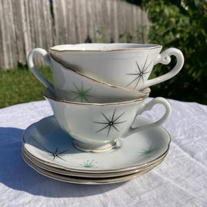 Vintage MCM Porcelain Teacup and Saucer Set of 3 Atomic Galaxy Starburst Stars with Gold Accents