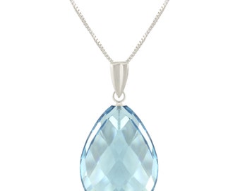 May include: A silver chain necklace with a teardrop-shaped blue topaz pendant.