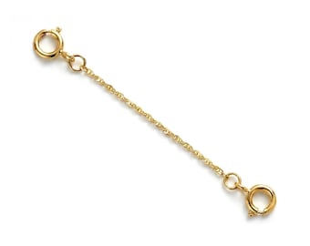Extensor de cadena Singapur de oro amarillo macizo de 14 k de 1,1 mm con protector de cadena de 1" a 10" y anilla de resorte en cada extremo.