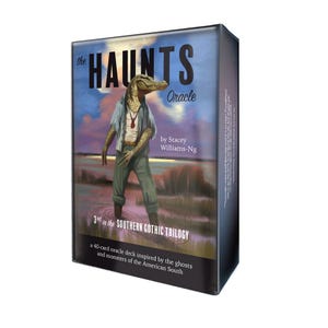 May include: A boxed oracle deck titled "The Haunts Oracle" by Stacey Williams-Ng. The box features an illustration of a humanoid alligator in a swamp setting. Text on the box reads "3rd in the Southern Gothic Trilogy" and describes the deck as inspired by ghosts and monsters.