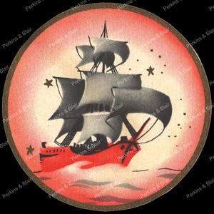 May include: Circular illustration of a red ship sailing on a wavy sea, with grey sails and a black mast. The ship is set against a pink background with stars and the text "Perkins & Blair" around the edge.