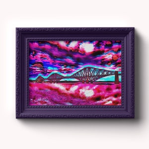 May include: A framed digital art print of a bridge over a body of water. The bridge is a steel truss bridge with a blue and pink colour scheme. The sky is a vibrant pink and blue with white clouds. The water is a deep pink.