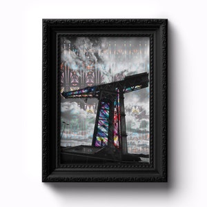 May include: A black and white photograph of a large industrial crane with a colourful stained glass pattern. The crane is set against a cloudy sky.