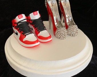 Nike Michael Jordan Air sneaker tennis/basketball shoe and rhinestone high heel wedding cake topper.  Groom's cake or Bridal Shower!