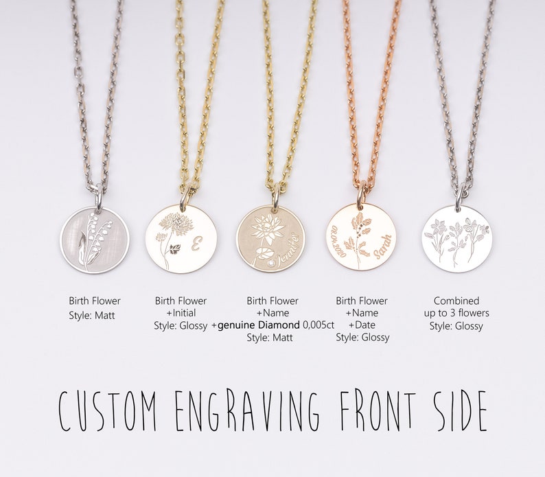 May include: Five silver necklaces with different charms. The charms are round and feature engraved birth flowers, initials, names, and dates. The necklaces are available in different styles, including matt and glossy finishes.  The text "CUSTOM ENGRAVING FRONT SIDE" is displayed below the necklaces.