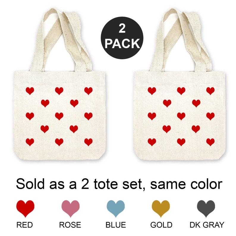 These mini heart tote bags are available in 5 colors and sold as a 2 piece set of the same color heart.