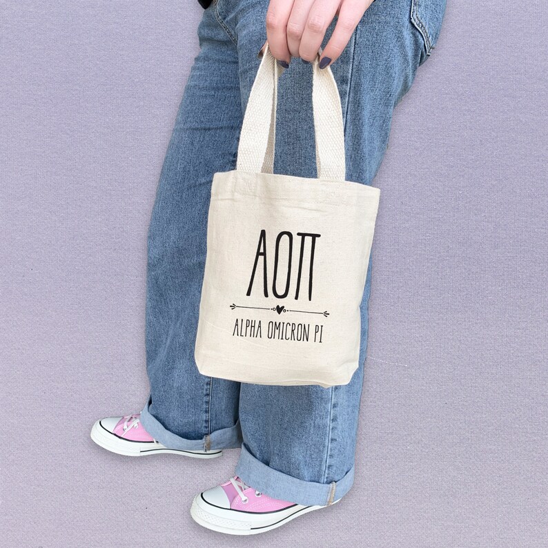 Boho theme AOPi sorority tote bag is perfect for gift giving as a reusable gift bag. Made of cotton canvas it is durable too.