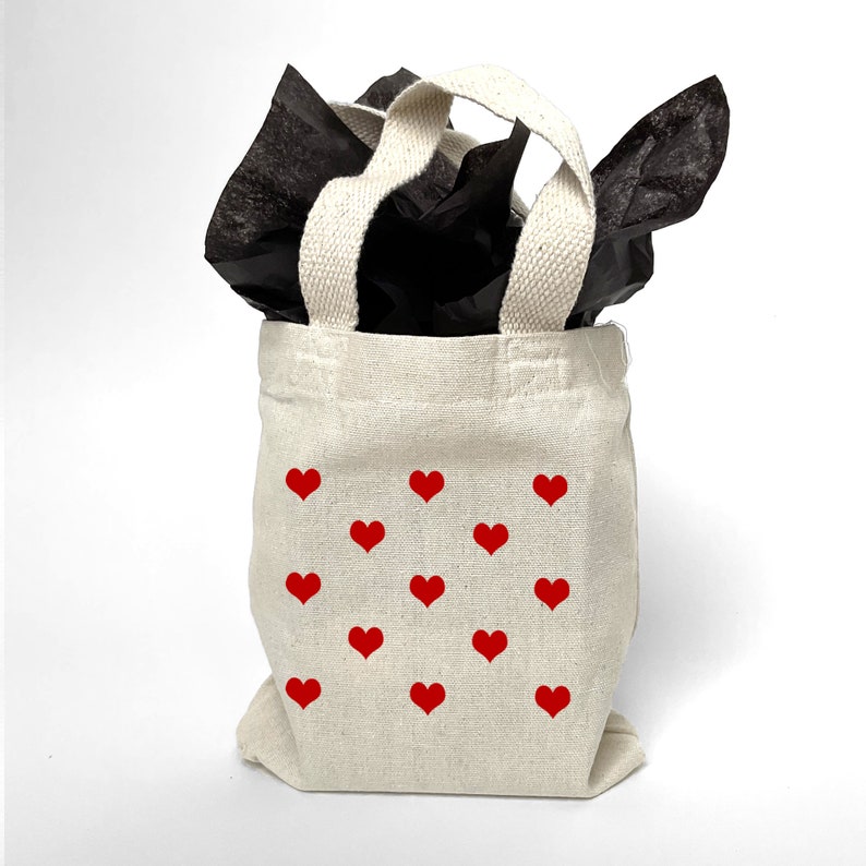 Decorate your heart gift bag with colorful tissue.