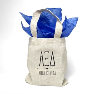 Boho theme AXiD sorority tote bag is perfect for gift giving as a reusable gift bag. Made of cotton canvas it is durable too.