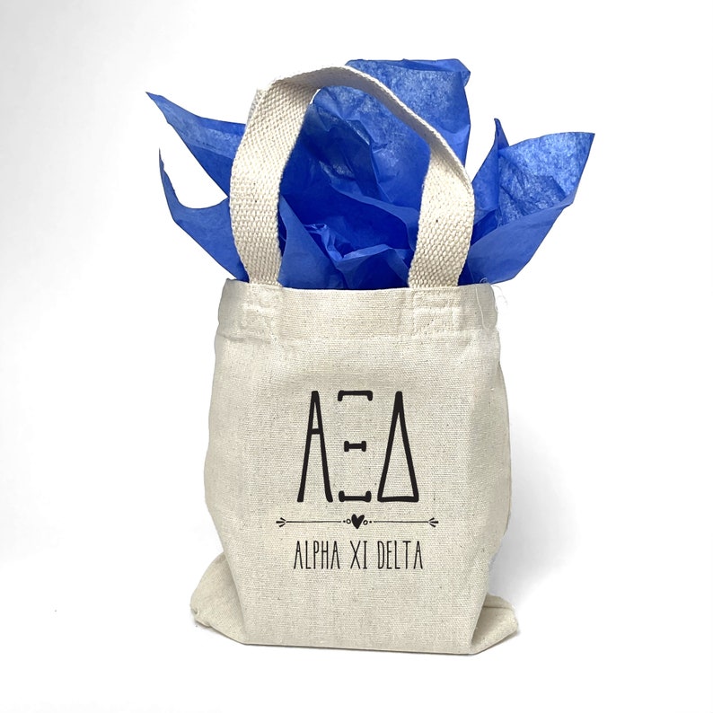 Boho theme AXiD sorority tote bag is perfect for gift giving as a reusable gift bag. Made of cotton canvas it is durable too.