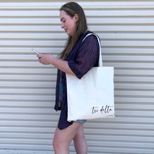 Tri Delta canvas tote bag makes a great carry all every day.