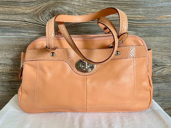 Coach coral purse sale